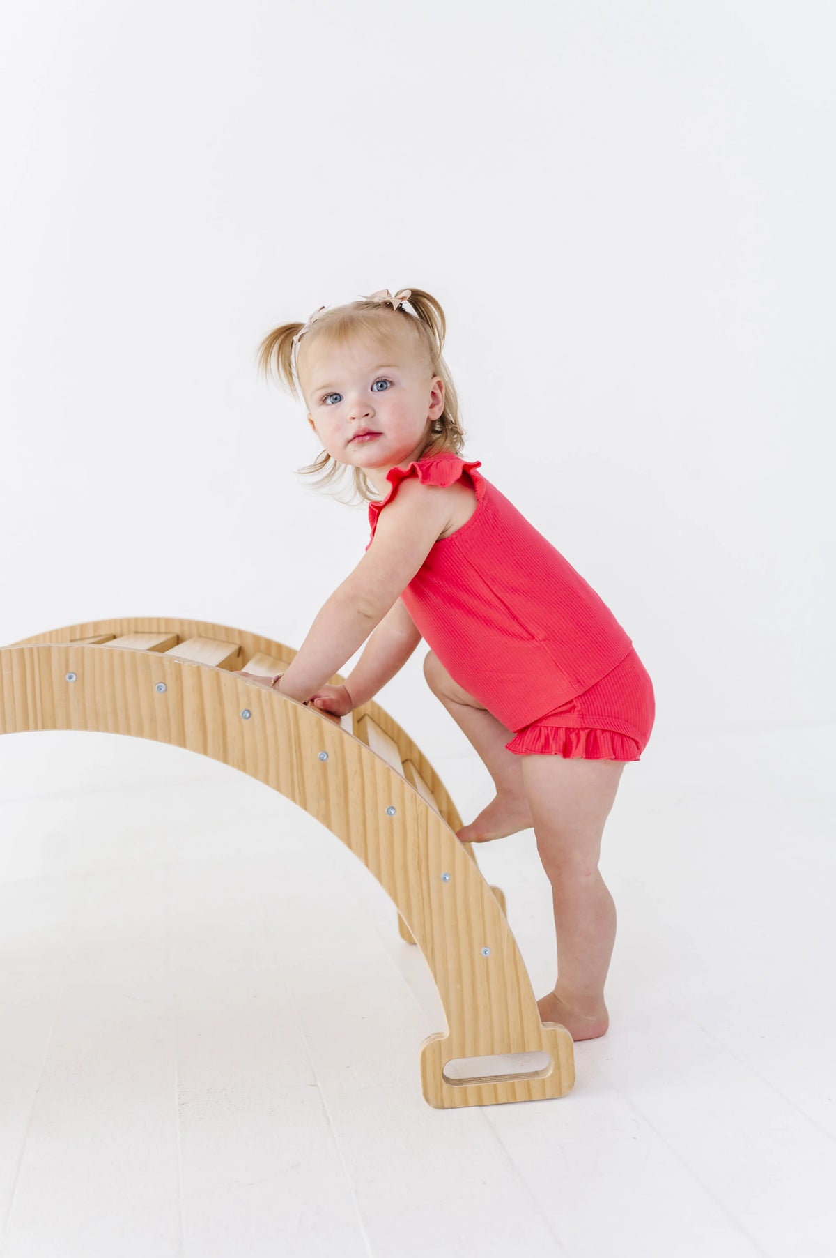 Baby crawling in the Onesie Tee