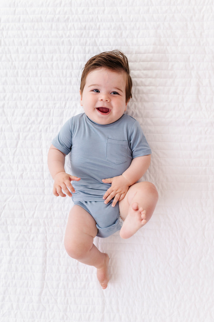Close up of the Onesie Tee fabric and snaps