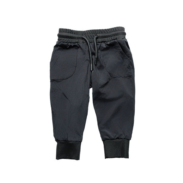 Black jogger pants on a white background