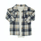 baby boy blue flannel button up shirt attached to a white bamboo baby onesie tshirt combination on a white background