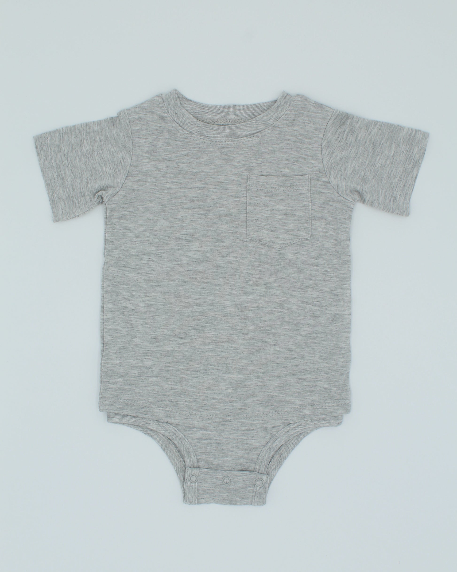 Gray baby onesie on a light gray background